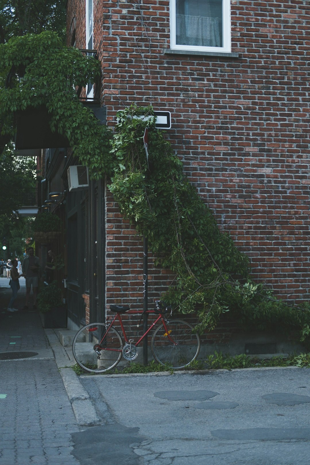 Quiet residential street with brick houses and bicycles in a Danish neighborhood
